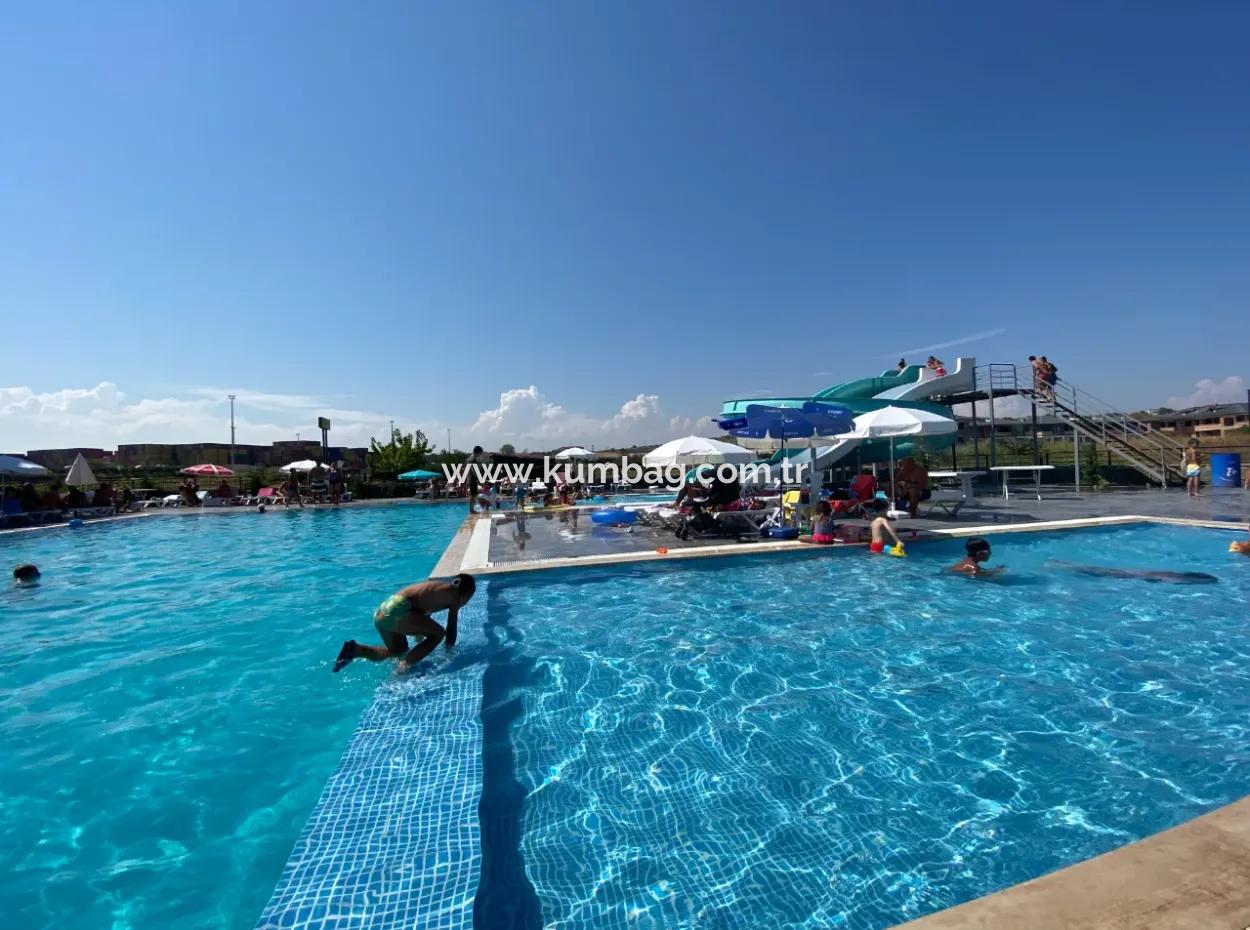 Kumbağ Havuzlu Aquaparkli Sitede Bahçe Kati Sezonluk Kiralik 1+1 Daire