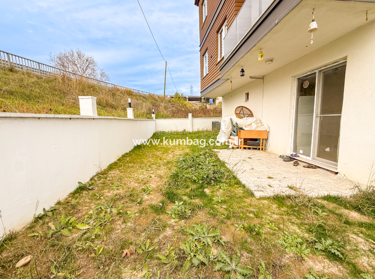 1 1 Wohnung Mit Garten In Einem Neuen Gebäude Auf Der Strandseite Der Strasse In Kumbağ