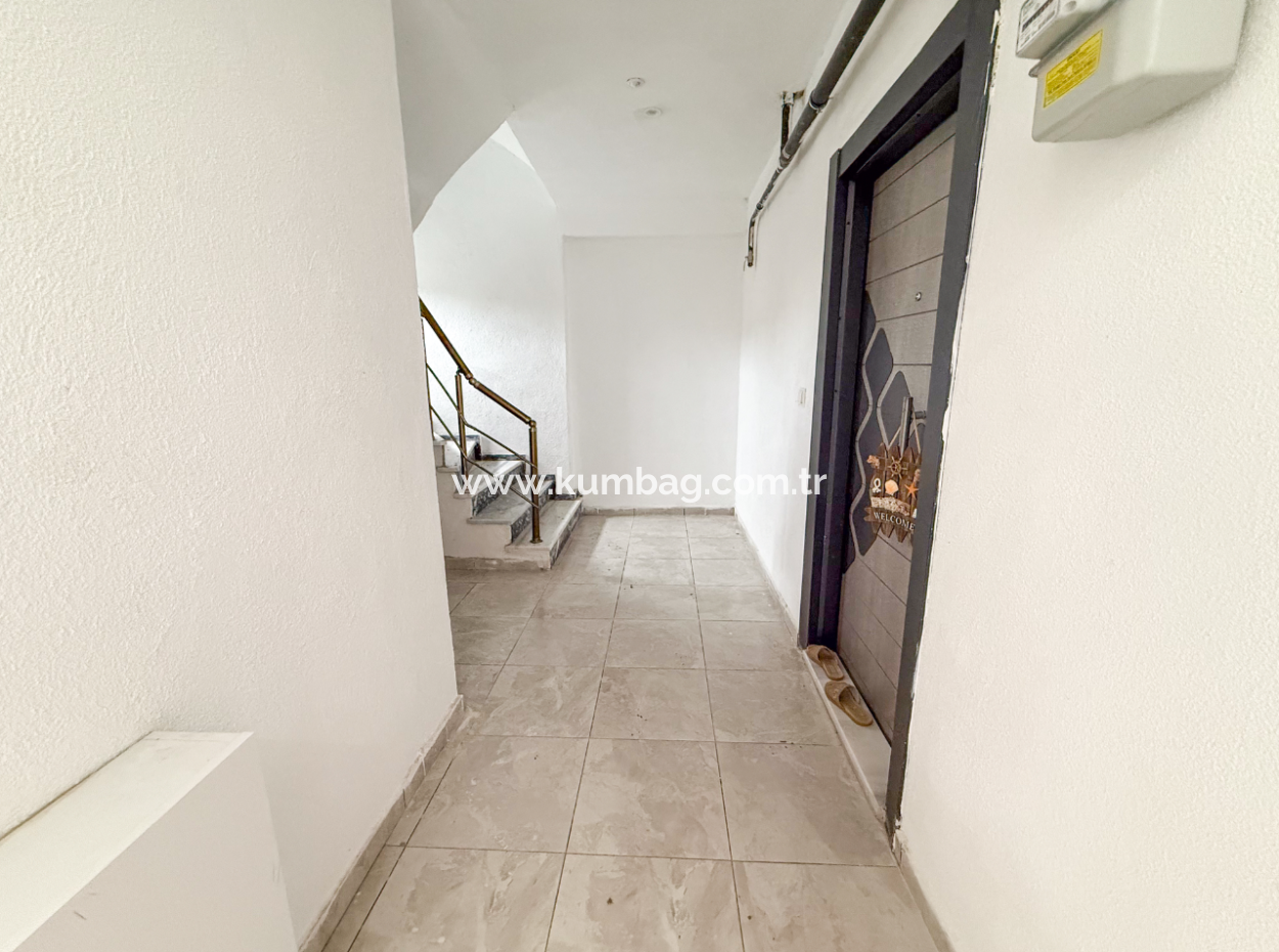 1 1 Wohnung Mit Garten In Einem Neuen Gebäude Auf Der Strandseite Der Strasse In Kumbağ