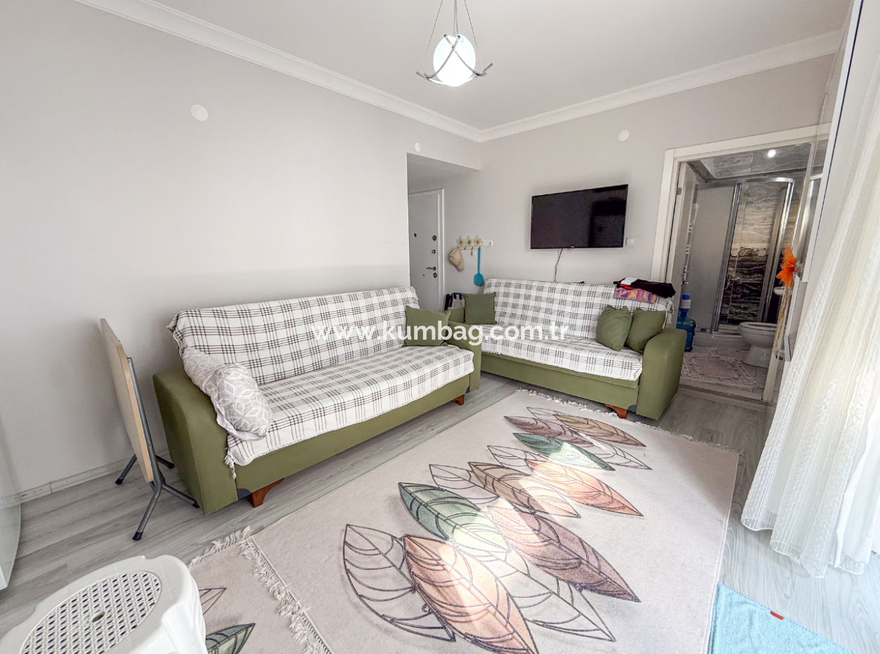 1 1 Wohnung Zum Verkauf In Einem Wohngebäude In Der Nähe Des Gündal-Strandes In Kumbağ