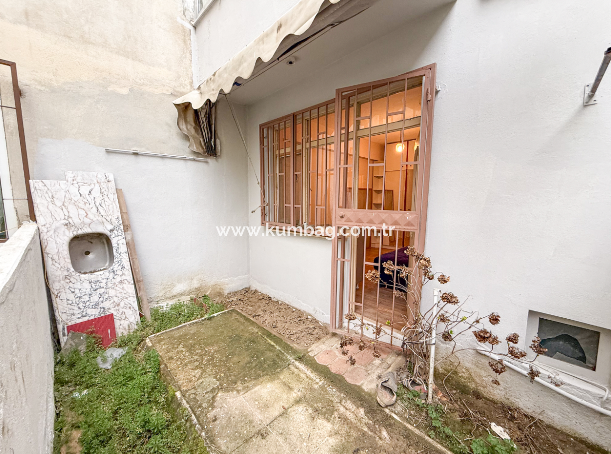 1 1 Wohnung Zum Verkauf Mit Garten Nahe Dem Meer In Der Kumbağ Hauptstrasse