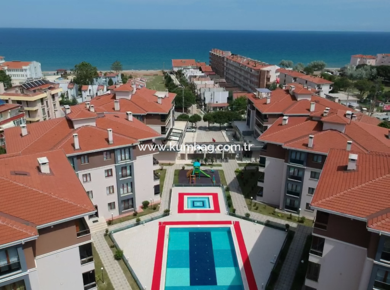 2 1 Wohnungen Zum Verkauf In Kumbağ Doğapark Häuser Mit Poolfassade Möbliert Möbliert