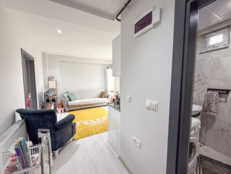 1 1 Wohnung Mit Garten In Einem Neuen Gebäude Auf Der Strandseite Der Strasse In Kumbağ