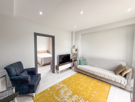 1 1 Wohnung Mit Garten In Einem Neuen Gebäude Auf Der Strandseite Der Strasse In Kumbağ