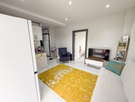 1 1 Wohnung Mit Garten In Einem Neuen Gebäude Auf Der Strandseite Der Strasse In Kumbağ