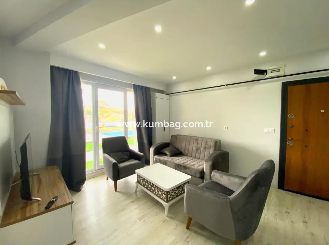 Kumbağ Havuzlu Sitede Bahçeli 1+1 Satilik Daire
