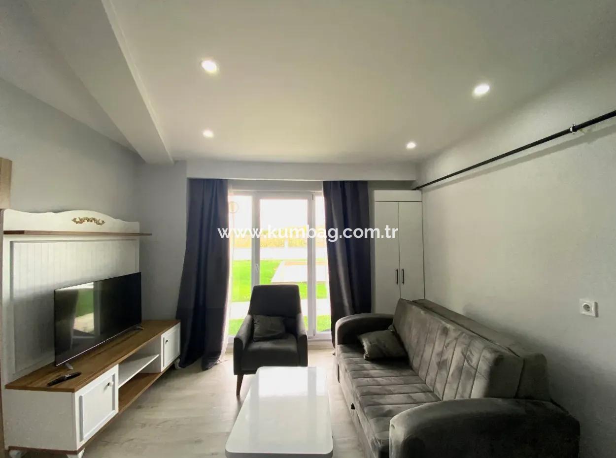 Kumbağ Havuzlu Sitede Bahçeli 1+1 Satilik Daire