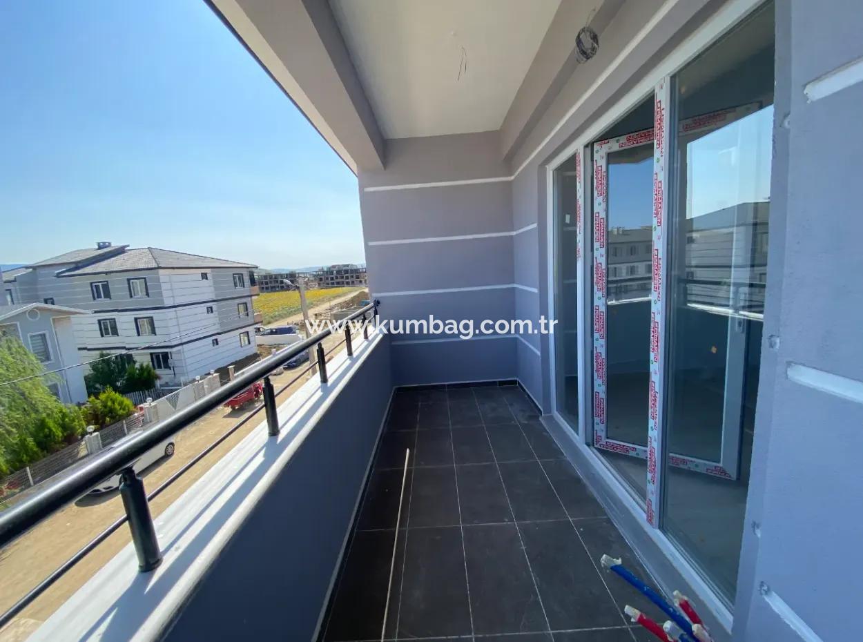 Kumbağ Mah.kumkent Mevkii Yeni Binada Satilik 2+1 Daire