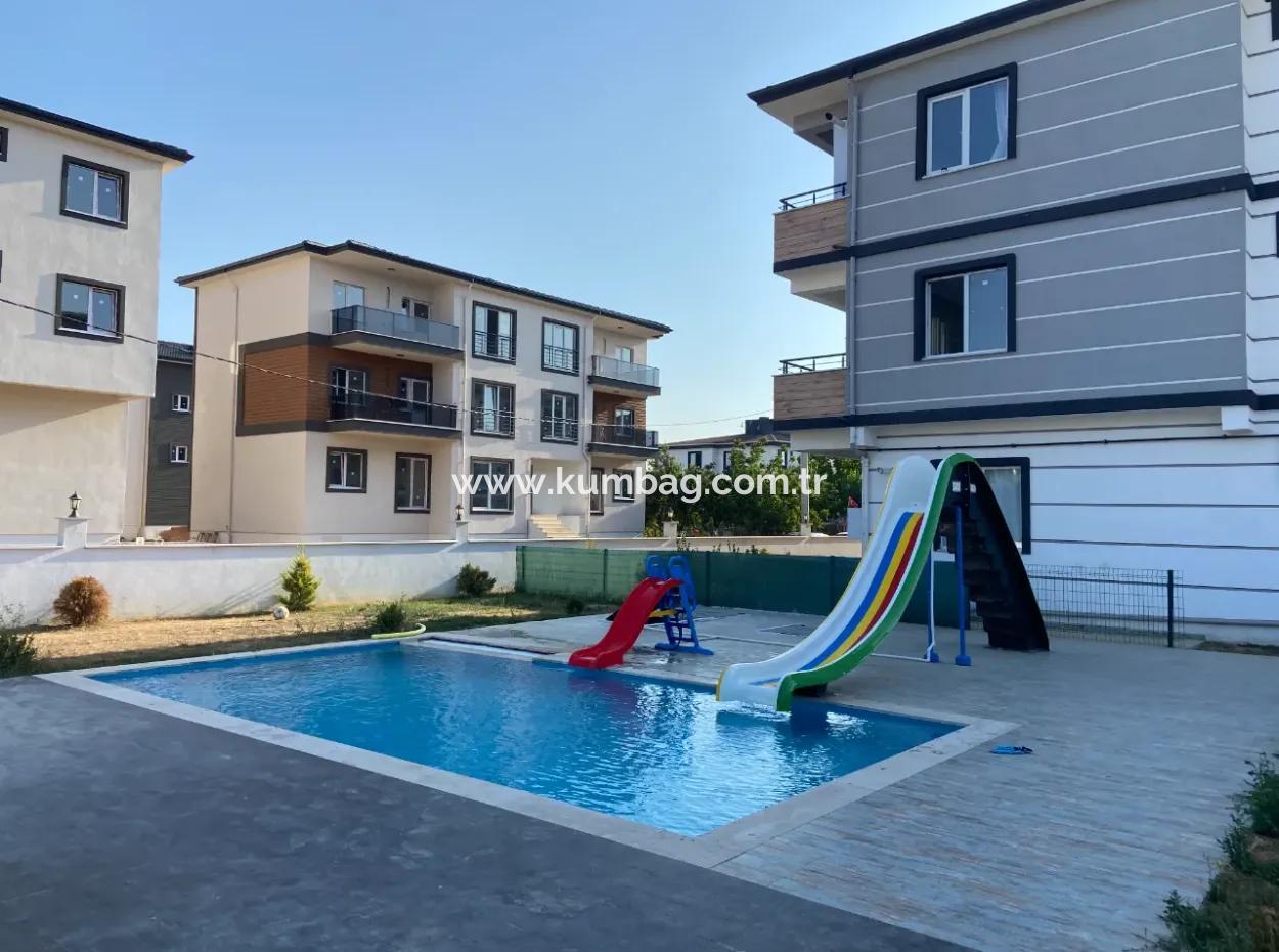Kumbağ Havuzlu Ve Aquaparkli Sitede Yaz-Kiş Kiralik 2+1 Daire