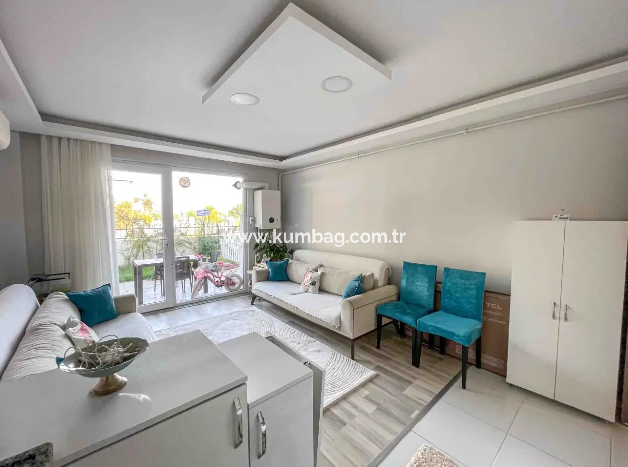 For Sale In A Complex With A Garden And Pool By The Sea In Kumbağ 2 1