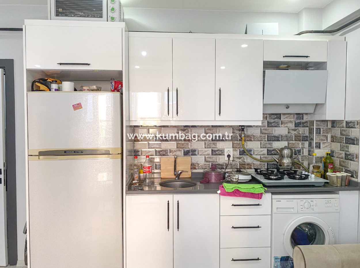 1 1 Apartment For Sale With Furnished Garden In New Building Close To Kumbağ Pazar Street