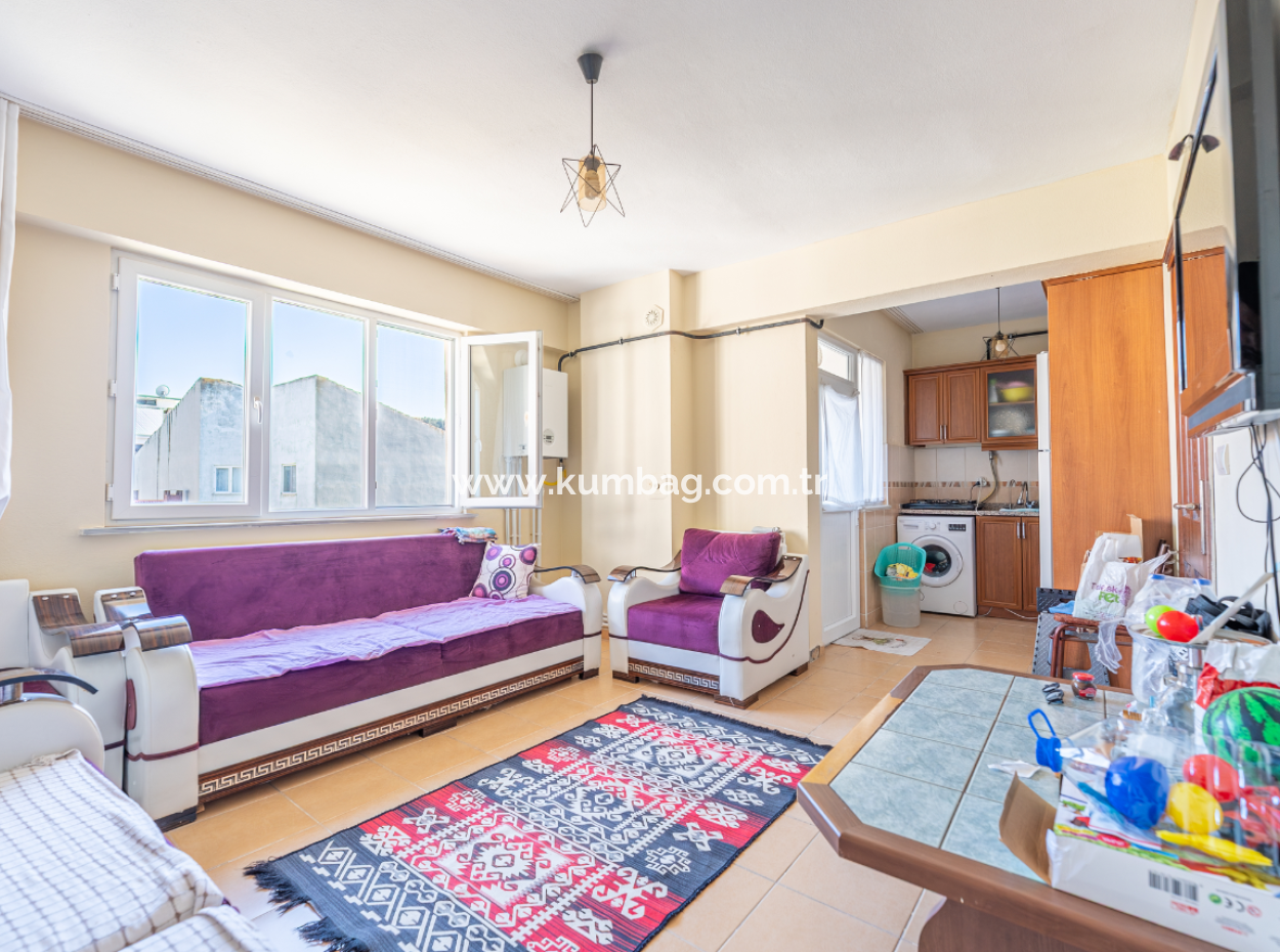 2 1 Flats For Sale In Kumbağ Market Street, Close To The Street And The Sea