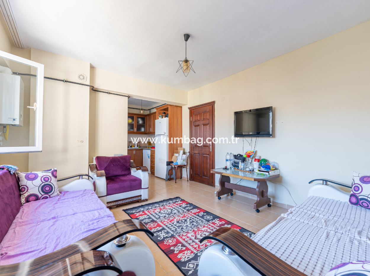 2 1 Flats For Sale In Kumbağ Market Street, Close To The Street And The Sea