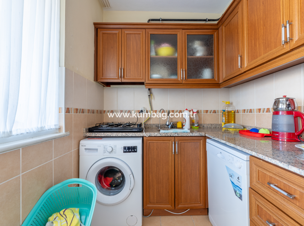 2 1 Flats For Sale In Kumbağ Market Street, Close To The Street And The Sea