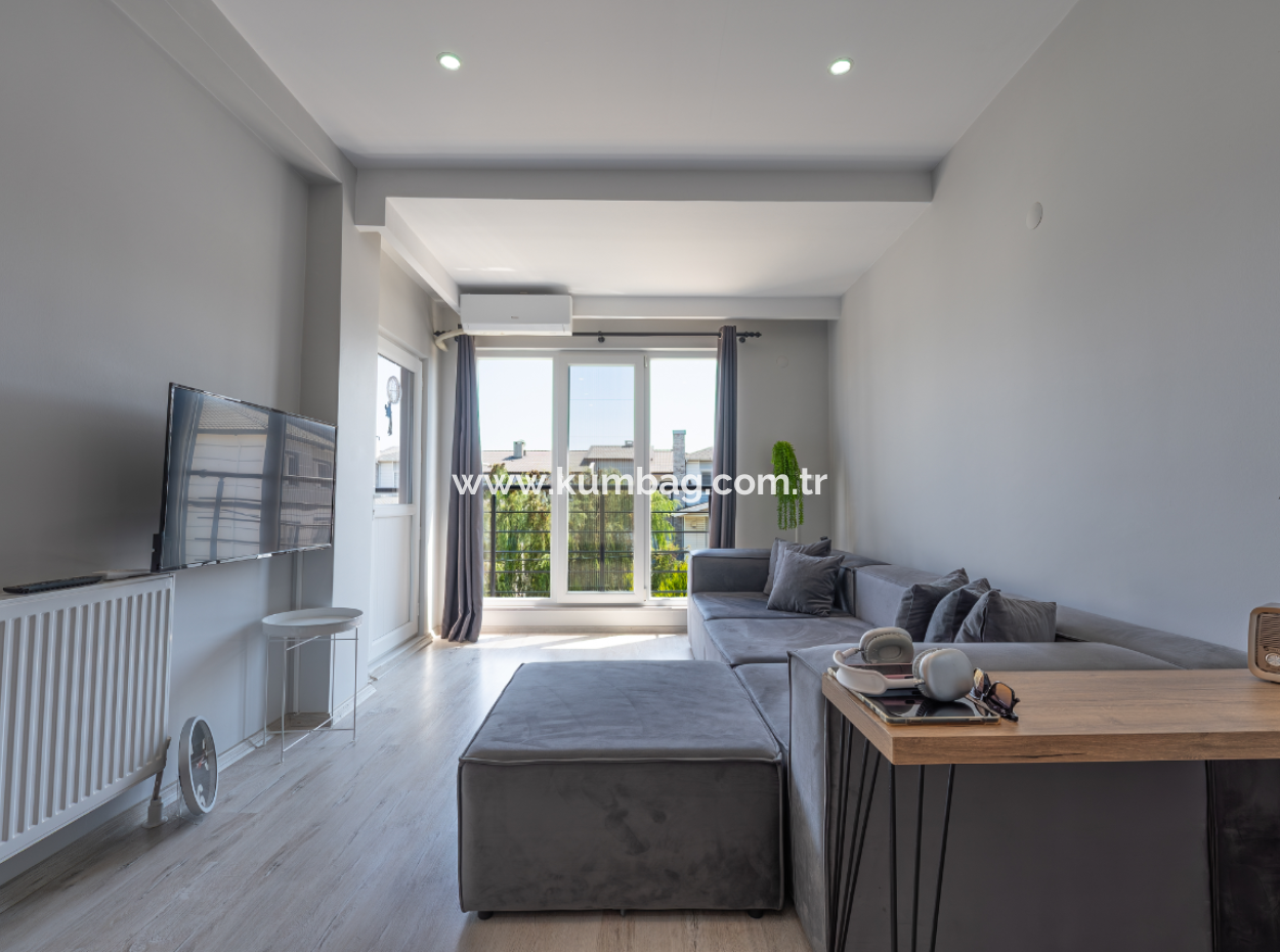 1 1 Flat For Sale In A New Building With Settlement In Kumbağ, Close To The Street
