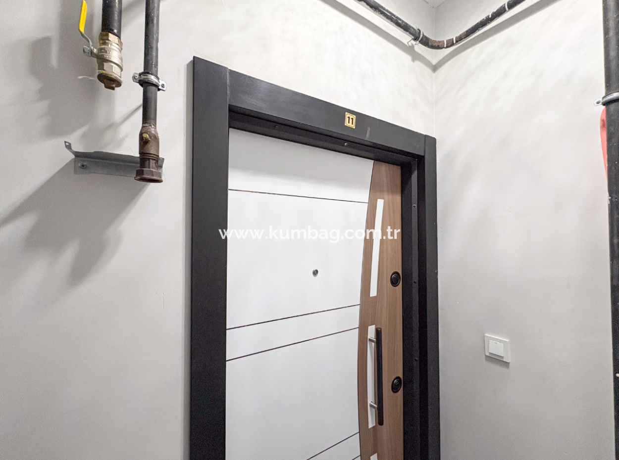 1 1 Flat For Sale In A New Building With Settlement In Kumbağ, Furnished On The Street
