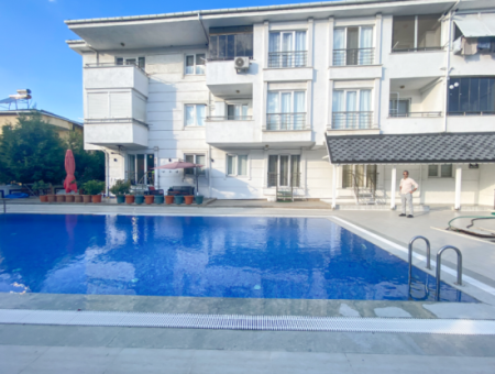 1 1 Flat For Rent With Garden In A Site With Pool In Kumbağ