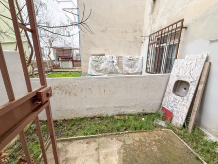 1 1 Flat For Sale With Garden Close To The Sea On Kumbağ Main Street