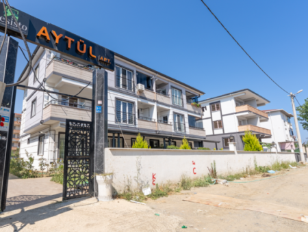 1 1 Flat For Sale In A New Building With Settlement In Kumbağ, Close To The Street