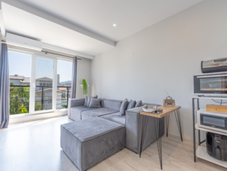 1 1 Flat For Sale In A New Building With Settlement In Kumbağ, Close To The Street