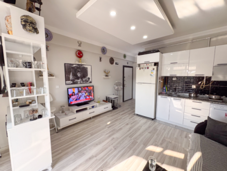 1 1 Flat For Sale In A New Building With Settlement In Kumbağ, Furnished On The Street