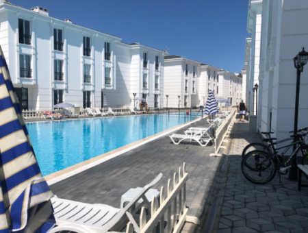 Furnished 2 1 Flats For Sale In A Site With A Pool By The Sea In Kumbağ