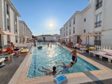 Furnished 2 1 Flats For Sale In A Site With A Pool By The Sea In Kumbağ