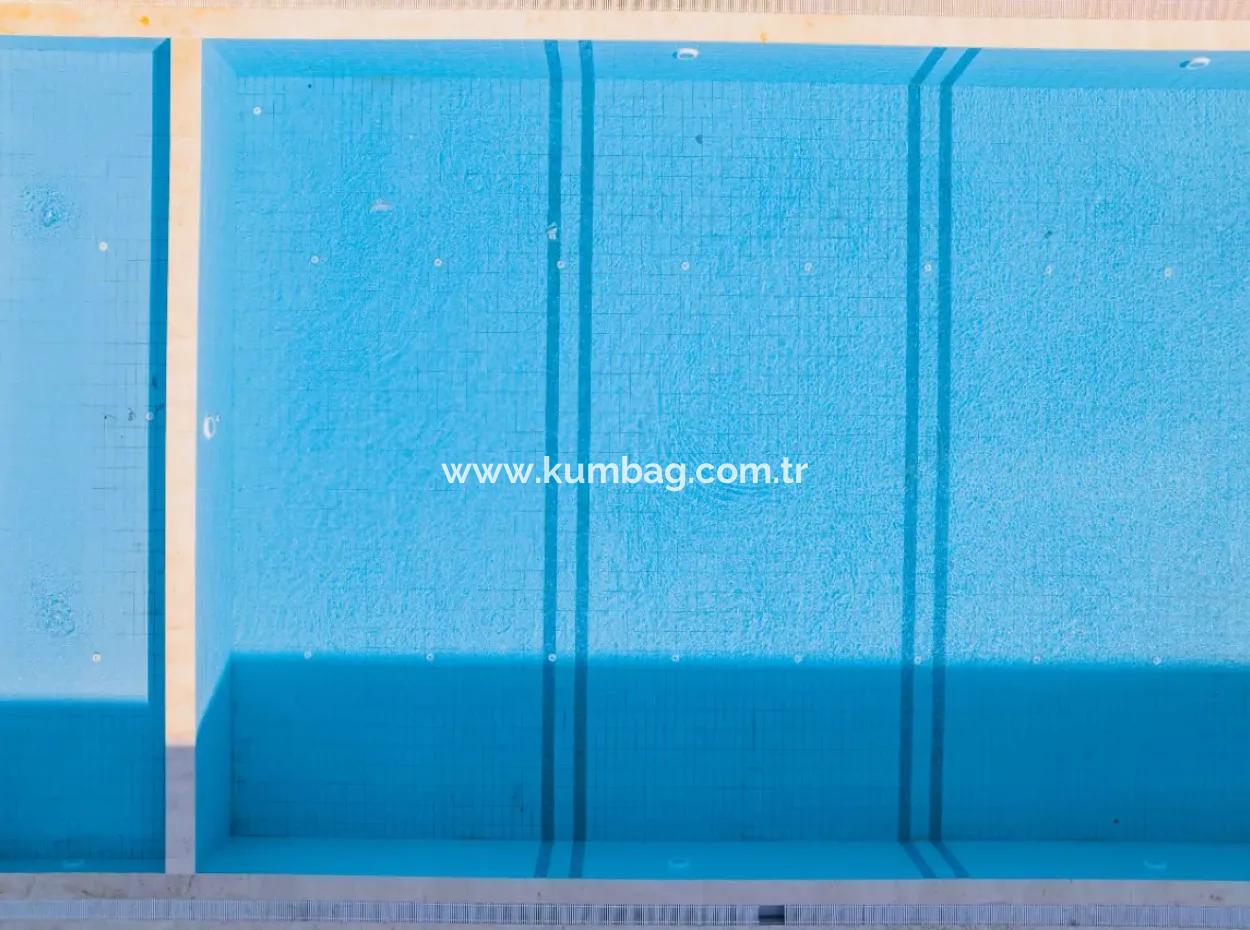 Kumbağ Mimoza Evlerinde Havuzlu Sezonluk Kiralık 3+1 Daire