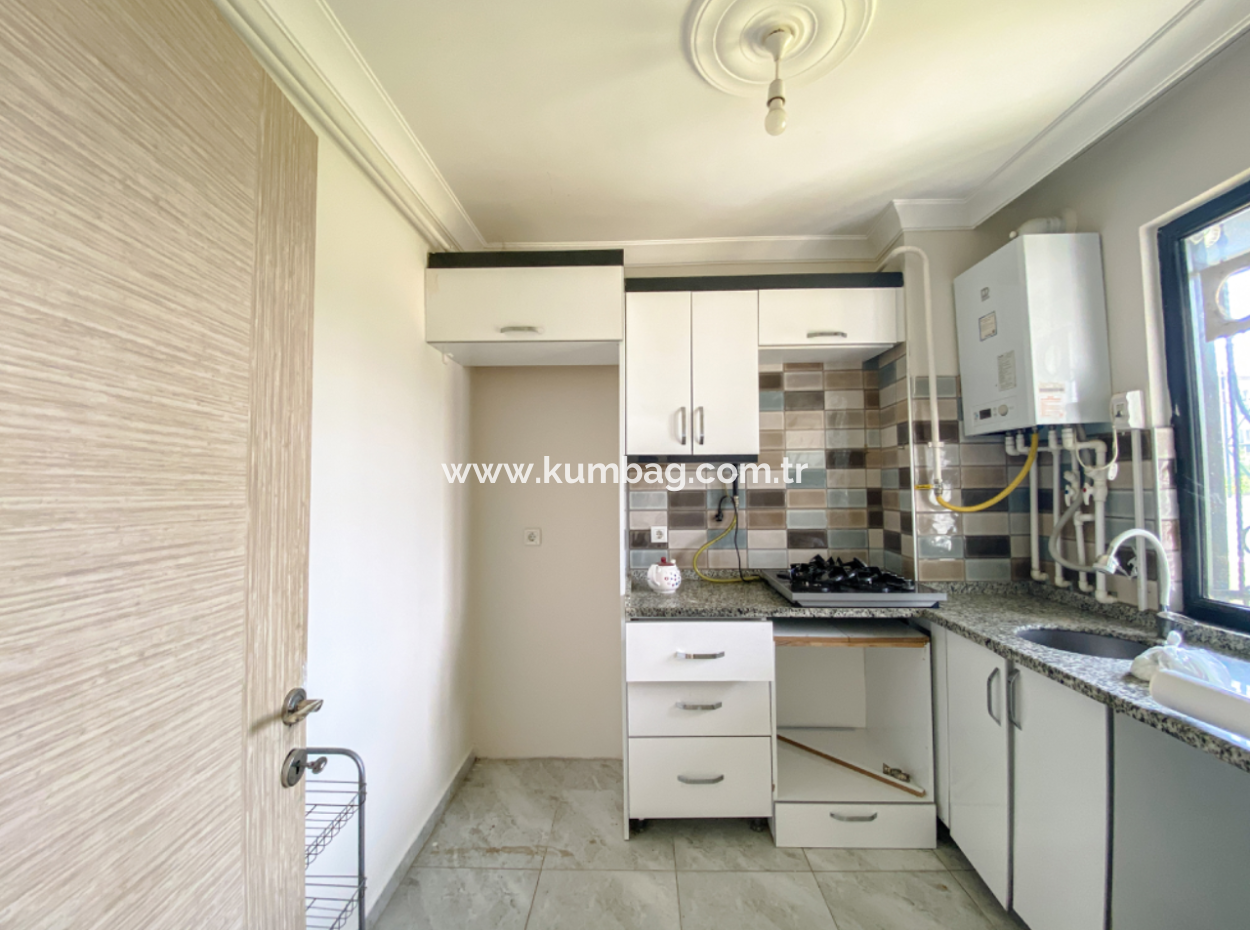 Kumbağ Mah. Ana Caddeye Yakın Ayrı Mutfaklı Bahçeli Yaz-Kış Kiralık 2+1 Daire