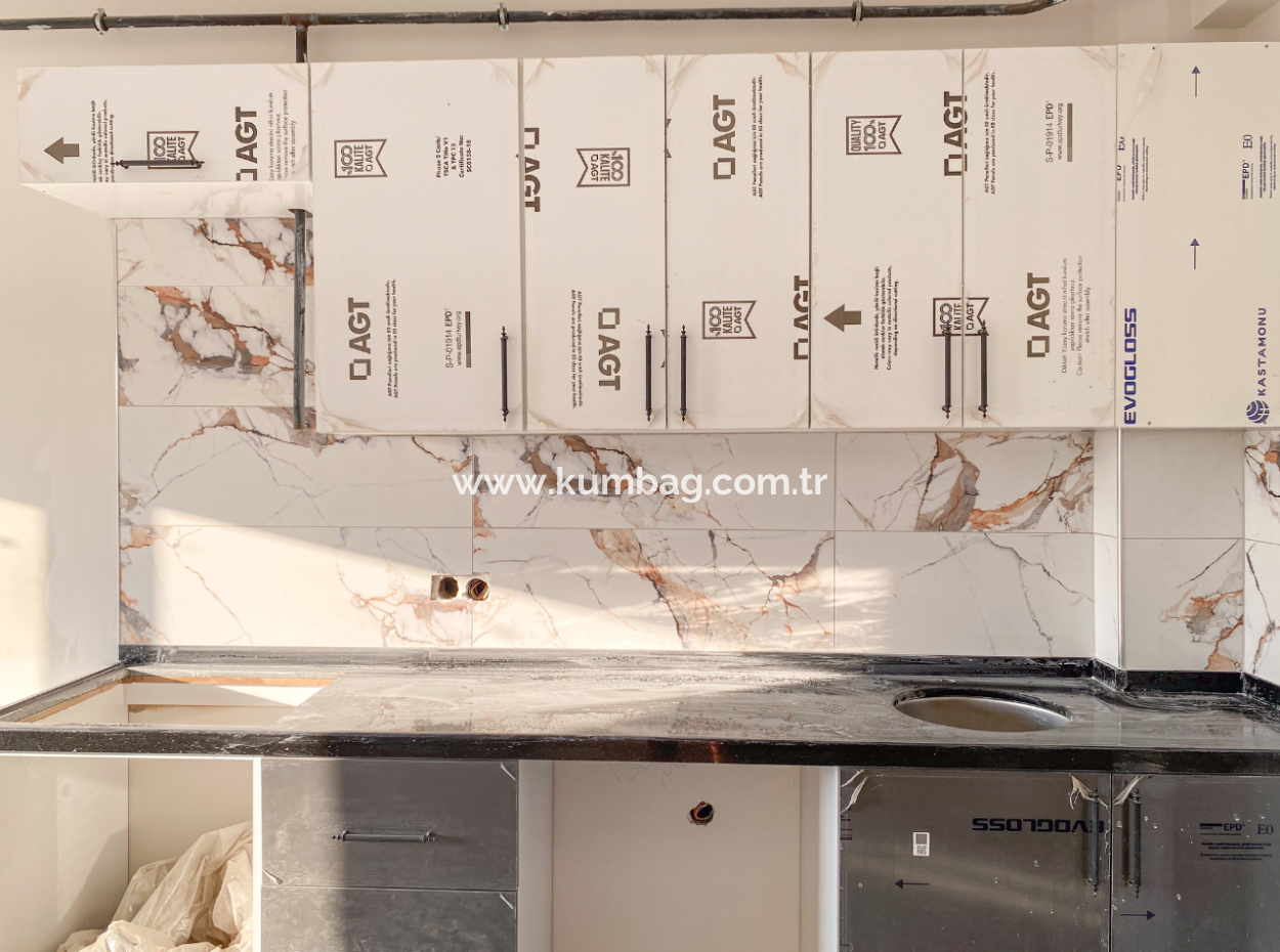 Kumbağ'da Cadde Üzerinde Havuzlu Sıfır 1+1 Satılık Daireler