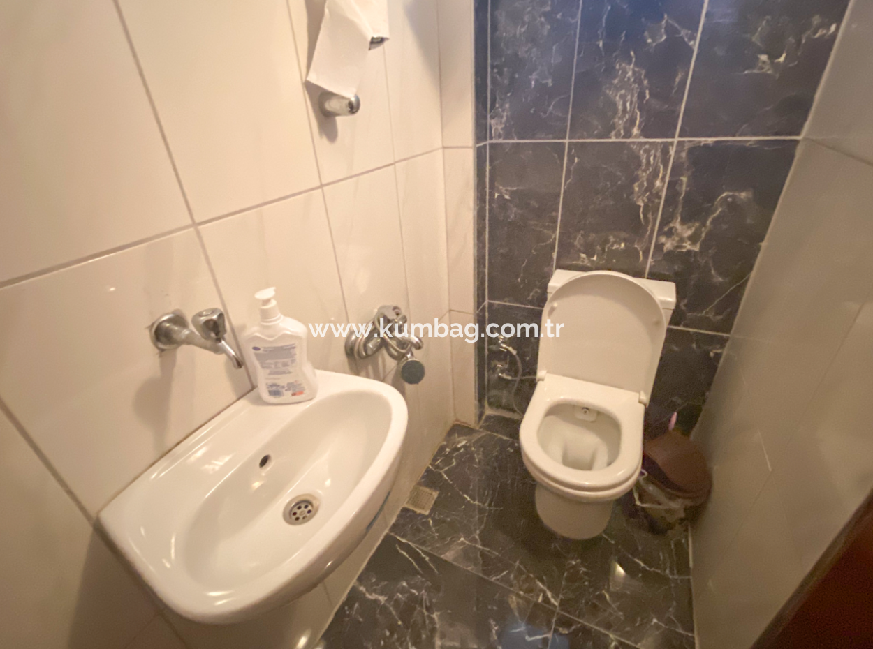  Kumbağ'da Denize Sıfır Site İçinde Satılık 3+1 Bahçeli Villa