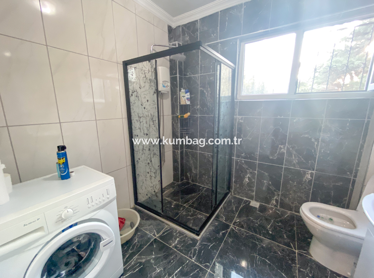  Kumbağ'da Denize Sıfır Site İçinde Satılık 3+1 Bahçeli Villa