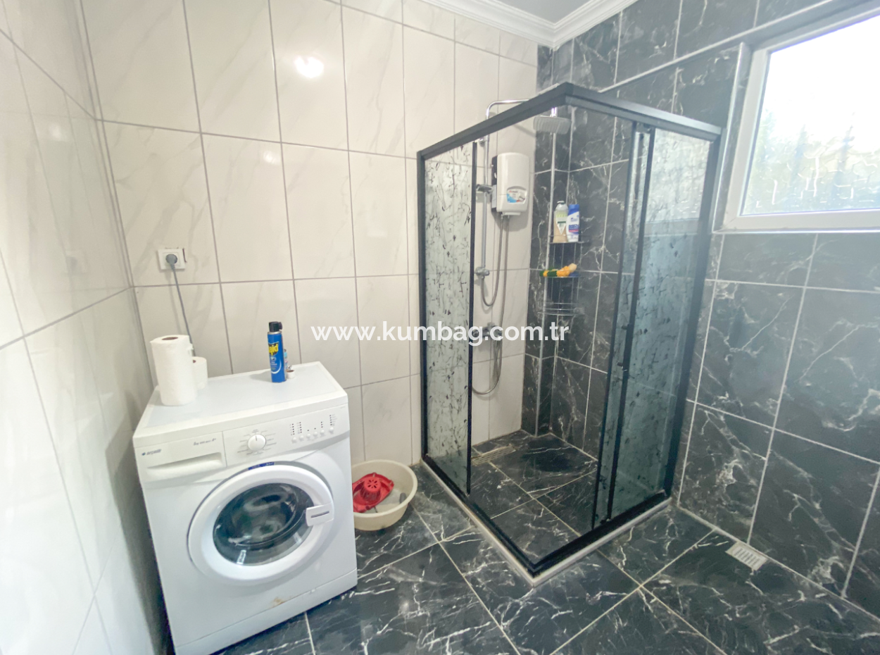  Kumbağ'da Denize Sıfır Site İçinde Satılık 3+1 Bahçeli Villa