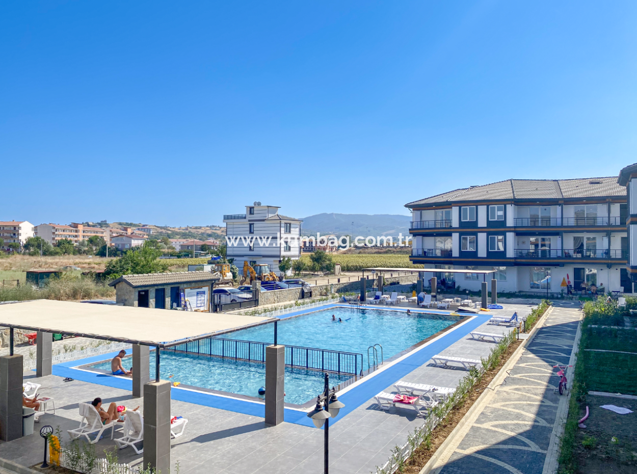 Kumbağ Havuzlu Sitede Denize Yakın Satılık Lüks 2+1 Daireler