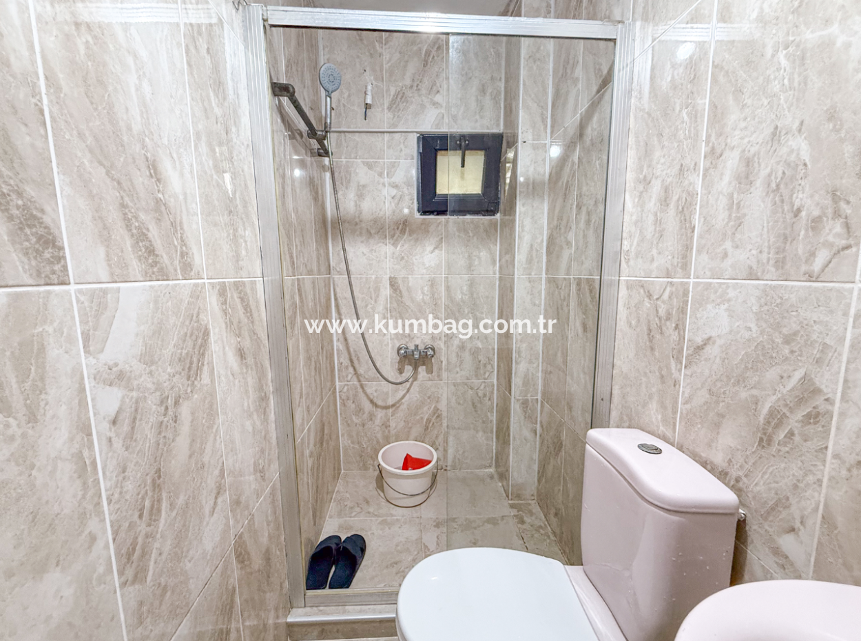 Kumbağ Merkezi Konumda Bahçeli Full Eşyalı 1+1 Satılık Daire