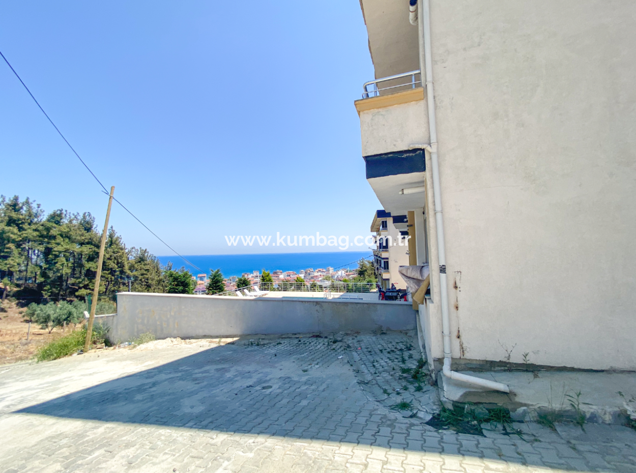 Kumbağ'da Deniz Manzaralı Havuzlu Full Eşyalı 2+1 Satılık Daire