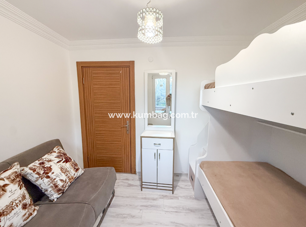 Kumbağ'da Deniz Manzaralı Havuzlu Full Eşyalı 2+1 Satılık Daire