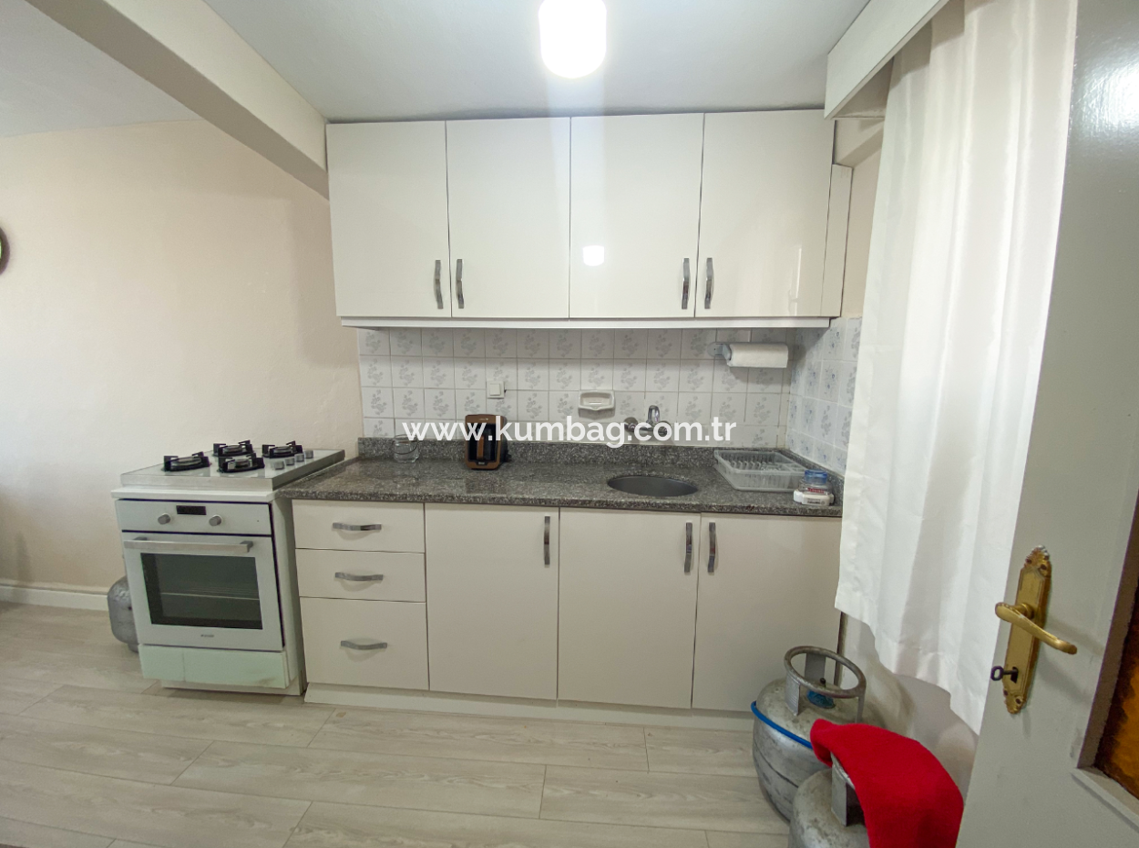 Kumbağ Merkezi Konumda Deniz Manzarlı Eşyalı Kiralık 2+1 Daire