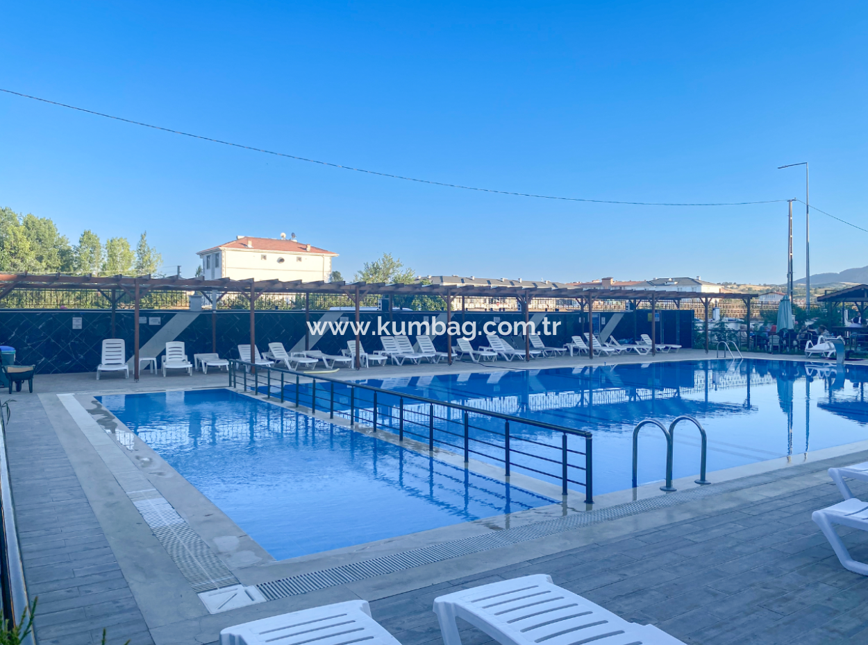 Kumbağ Havuzlu Sitede Eşyalı Kiralık Lüks 1+1 Bahçe Katı Daire
