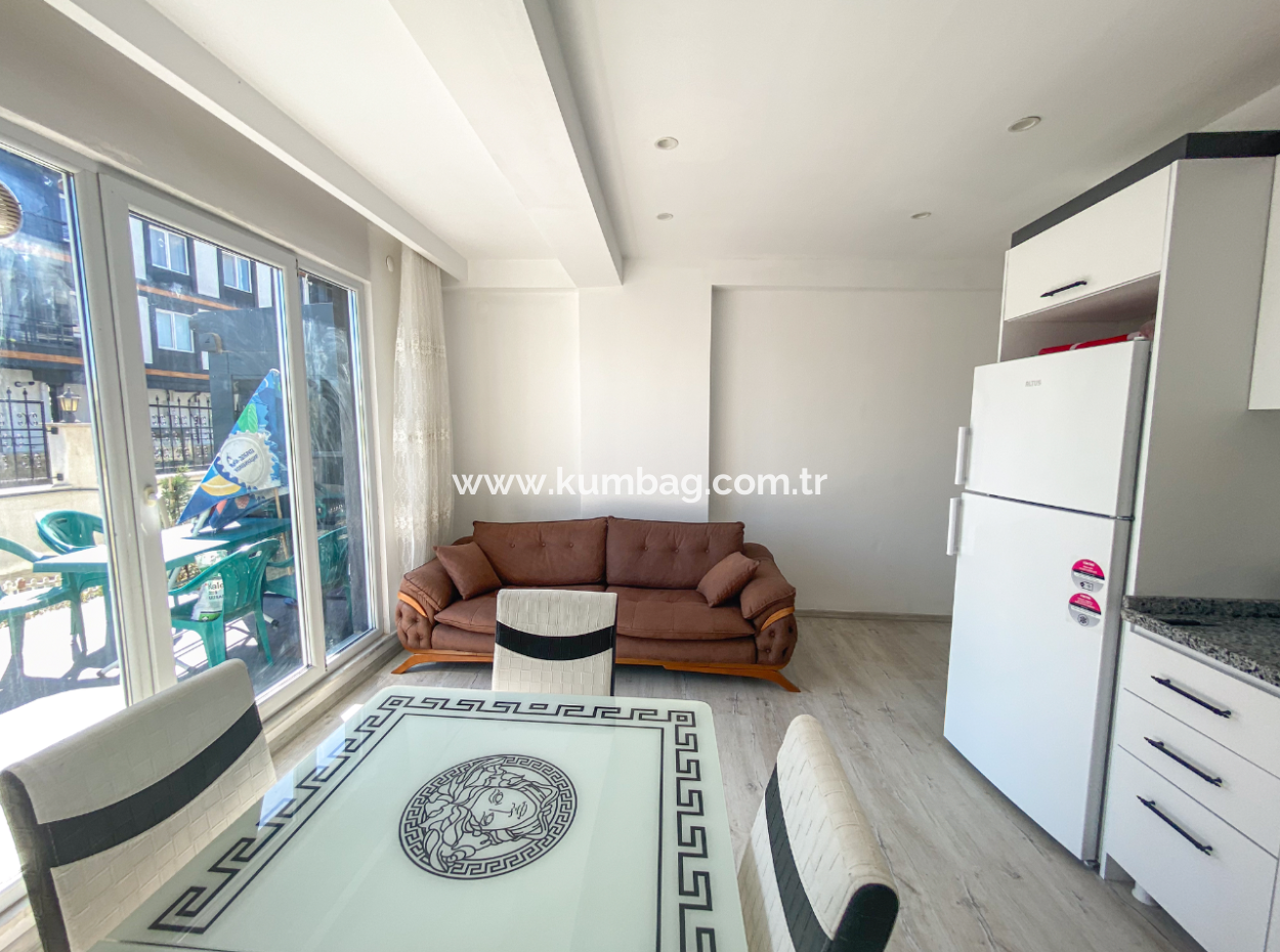 Kumbağ Havuzlu Sitede Eşyalı Kiralık Lüks 1+1 Bahçe Katı Daire