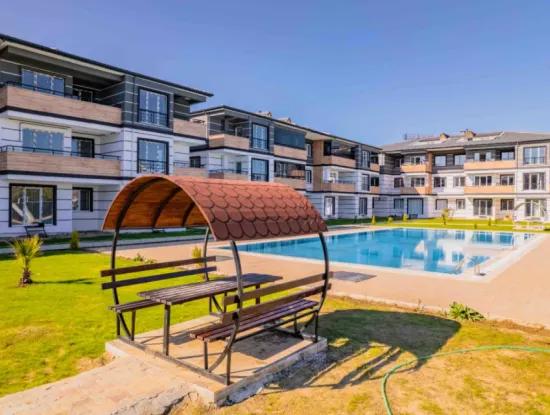 Kumbağ Mimoza Evlerinde Havuzlu Sezonluk Kiralık 3+1 Daire