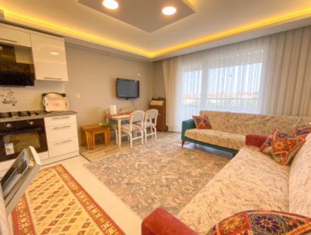Kumbağ'da Denize Sıfır Havuzlu Sitede Sezonluk Kiralık 2+1 Daire