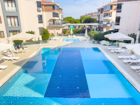 Kumbağ Doğapark Evlerinde Havuz Cephe Eşyalı Satılık 2+1 Daire